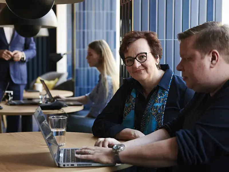 Personer taler om nordisk lønadministration